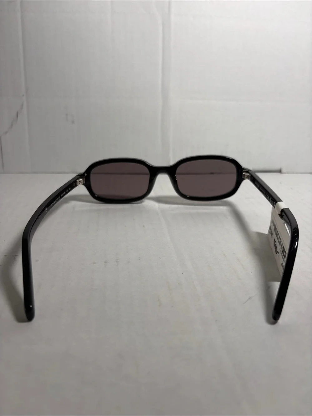 Prada 0PR Dogs Oval Frame Sunglasses in Black
